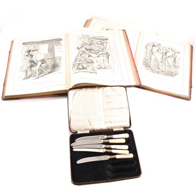 Lot 170 - A cased set of silver apostle top teaspoons other flatware, 2 volumes of Cartoons from Punch.