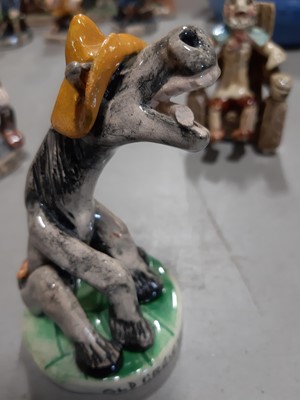 Lot 72 - Will Young Devonshire pottery group, 'Bringing home the old grey mare', and seven similar figures