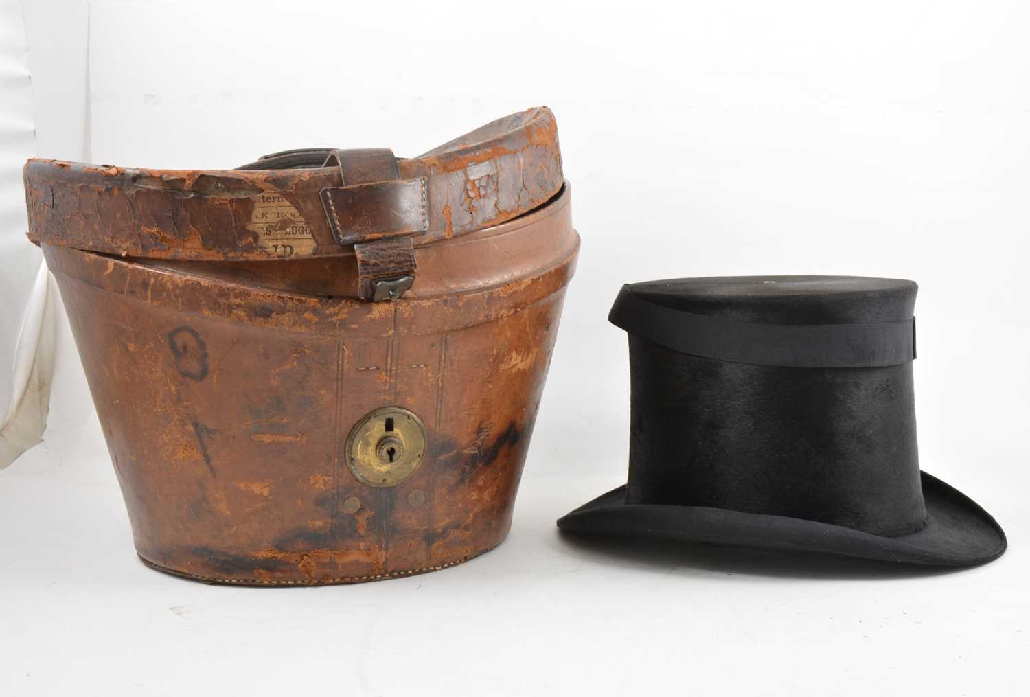 Lot 187 Leather top hat box and a black silk top hat