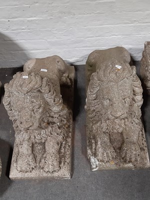 Lot 563 - Two garden lion sculptures