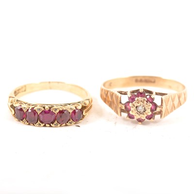 Lot 311 - A ruby five stone ring and a cluster ring.