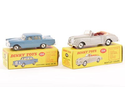 Lot 84 - Two Dinky Toys; no.186 Mercedes Benz 220 SE, no.194 Bentley Coupe, both in original boxes.