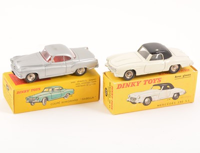 Lot 102 - Two French Dinky Toys; no.526 Mercedes 190 SL, cream and black body, no.549 Coupe Borgward Isabella, silver body with red interior, both in original box.