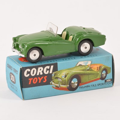 Lot 124 - Corgi Toys; no.301 Triumph T.R.2 Sports car, green body, cream seats, in original box.