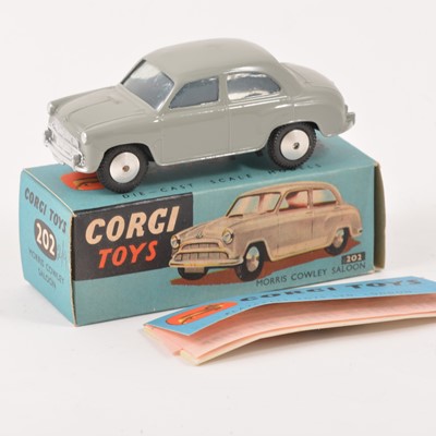 Lot 126 - Corgi Toys; no.202 Morris Cowley Saloon, grey body, spun hubs, in original box and booklet.