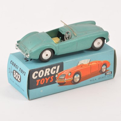 Lot 127 - Corgi Toys; no.302 M.G.A Sports car, green body, spun hubs, cream seats, in original box and booklet.