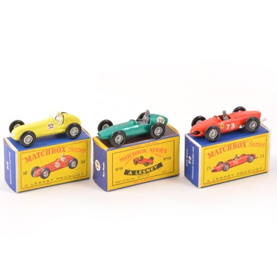 Lot 148 - Three Matchbox Toys 1-75 series; no.19 Aston Martin Racer, no.52 Maserati 4 CLT/1948, no.73 Ferrari racing car, all boxed.