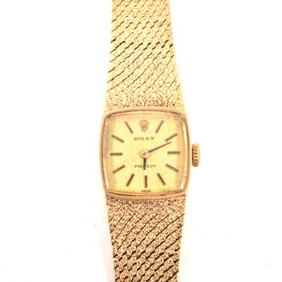 Lot 232 - Rolex - a 9 carat yellow gold bracelet watch.