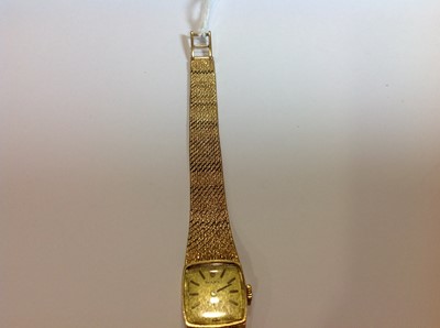 Lot 232 - Rolex - a 9 carat yellow gold bracelet watch.