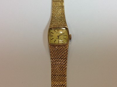 Lot 232 - Rolex - a 9 carat yellow gold bracelet watch.