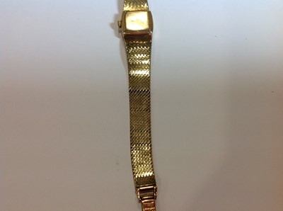 Lot 232 - Rolex - a 9 carat yellow gold bracelet watch.