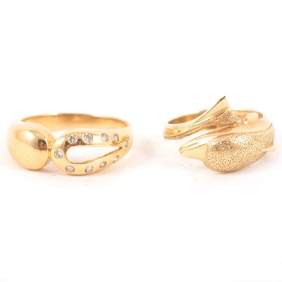 Lot 188 - Two modern gold dress rings.