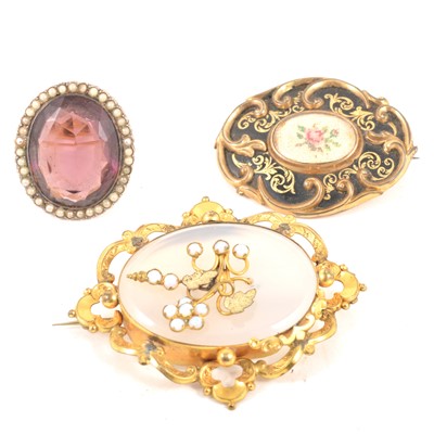 Lot 209 - Two Victorian brooches and a ring converted from a brooch.