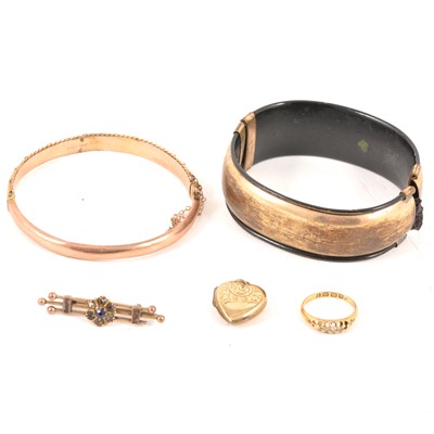 Lot 211 - A 9 carat yellow gold half hinged bangle, small diamond ring, bar brooch, back and front locket, and gold-plated bangle.