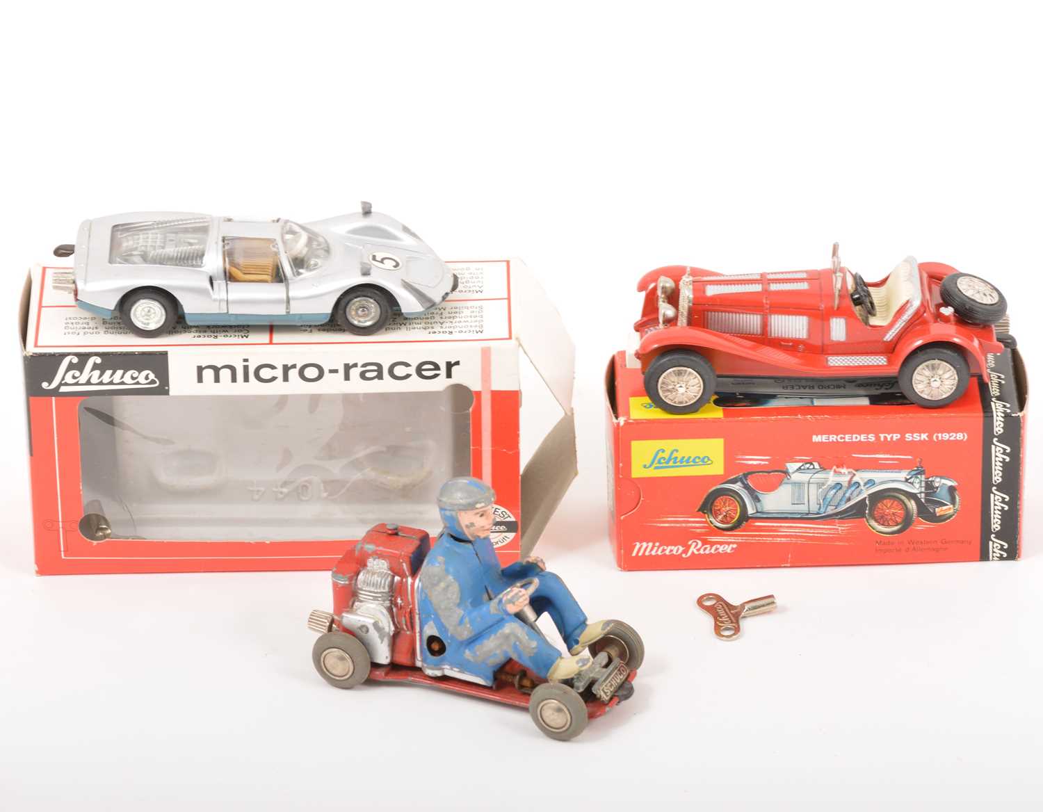 Lot 177 - Schuco Micro-racer wind-up models; three including no.1043 Mercedes TYP SSK.