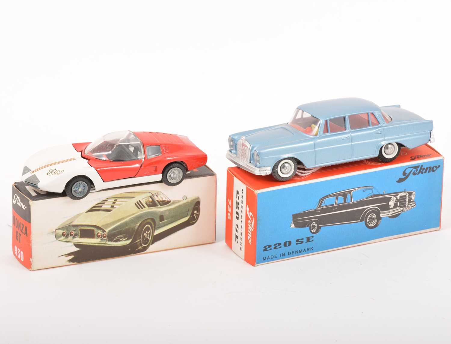 Lot 172 - Two Tekno Toys Denmark; no.930 Monza GT, white and red body, no.726 Mercedes-Benz 220 SE, grey/blue body, red interior, in original box.