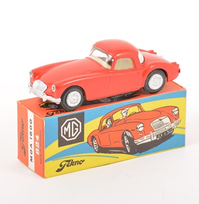 Lot 175 - Tekno Toys Denmark; no.824 MGA 1600, red body, cream seats, in original box.