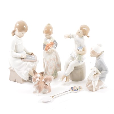 Lot 133 - Four Lladro figures, children and a small dog, an unmarked spoon.