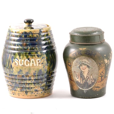 Lot 51 - A Dark Shag stoneware shop tobacco jar with tin lid and a majolica glaze sugar jar.