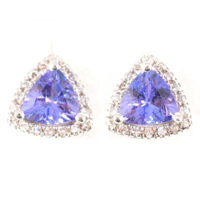Lot 210 - A pair of tanzanite and diamond cluster earstuds.