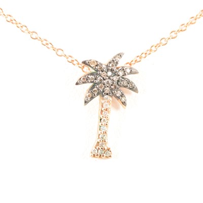 Lot 221 - A chocolate and white diamond novelty palm tree pendant and chain