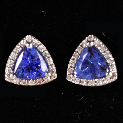 Lot 211 - A pair of tanzanite and diamond cluster earstuds