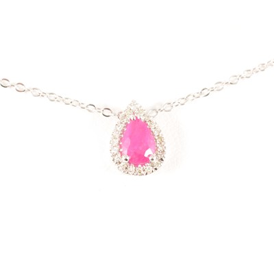 Lot 217 - A ruby and diamond pendant.