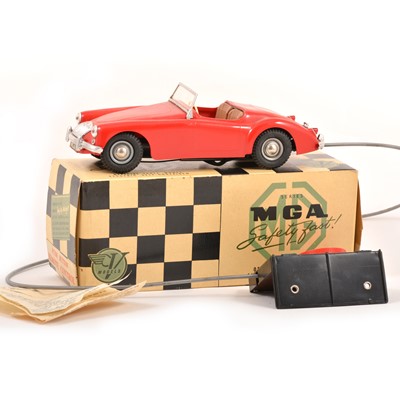 Lot 213 - Victory Industries plastic battery operated model; MGA sports car in red, boxed with leaflet.