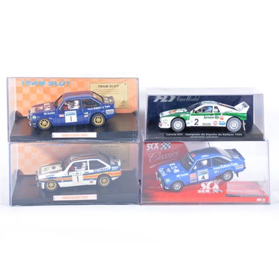 Lot 217 - Four slot-car racing models; including SCX Ford Escort MkII