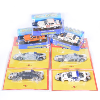 Lot 214 - Four Scalextric slot-car racing models.