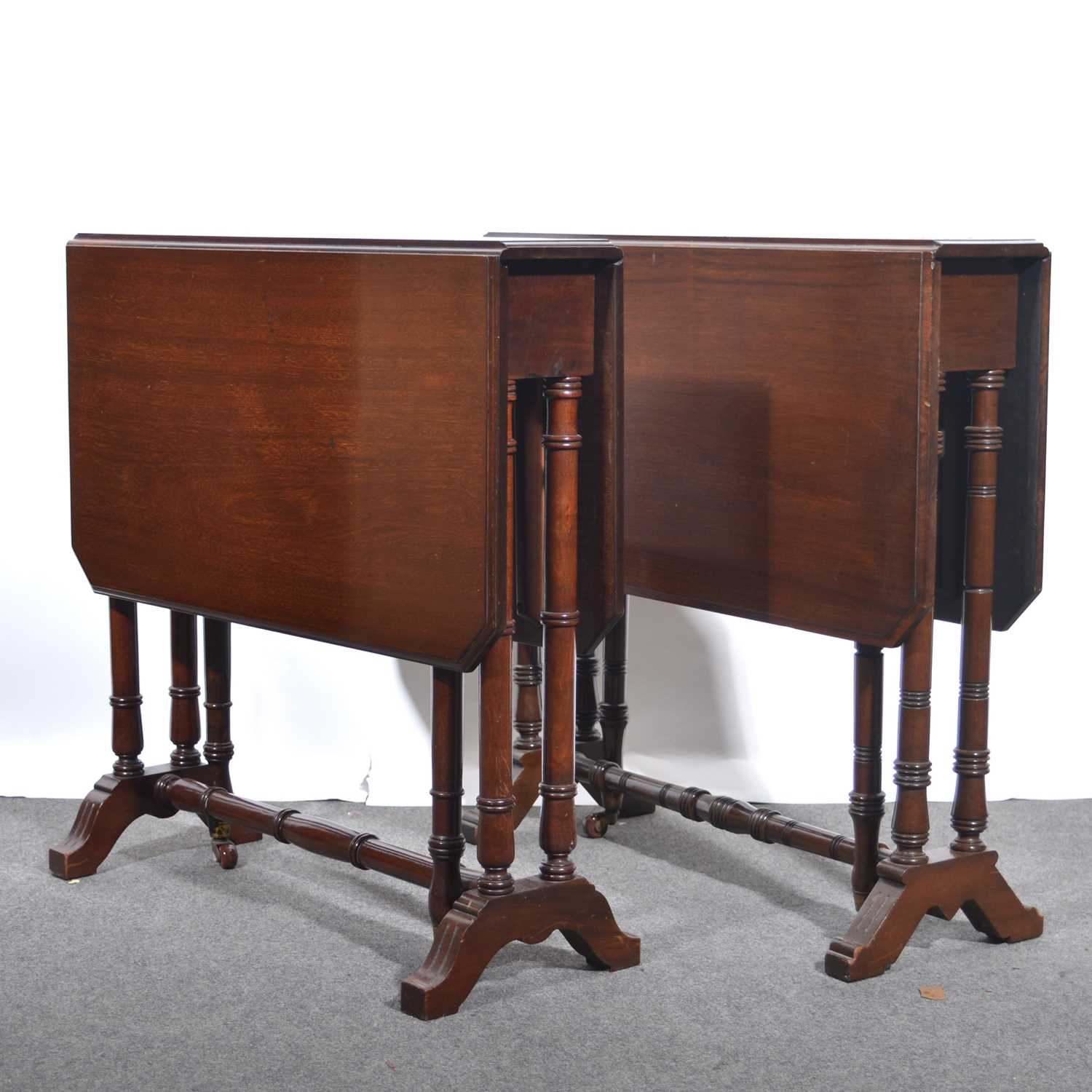 Lot 441 Pair of Edwardian walnut Sutherland tables.