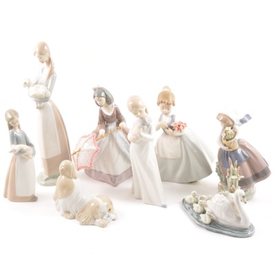 Lot 5 - Eight Spanish porcelain figures, including Lladro and Nao