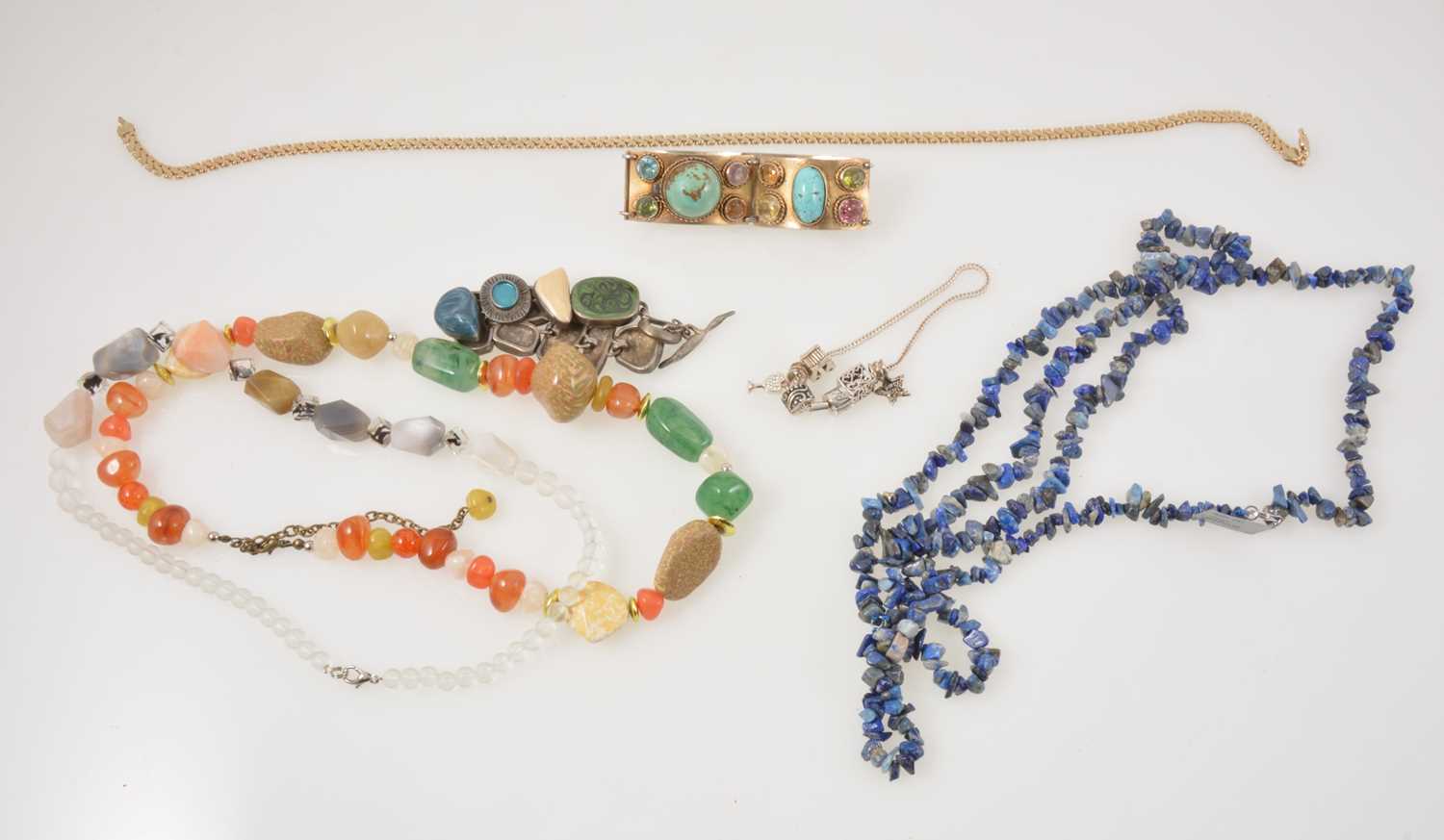 Lot 380 - A collection of gold, silver and costume jewellery, including natural stones.