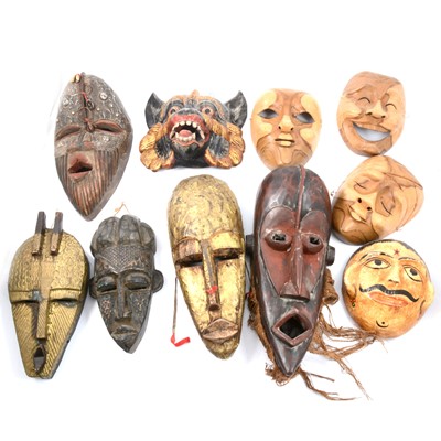 Lot 140 - Collection of ten tribal, Indian, and Japanese face masks.