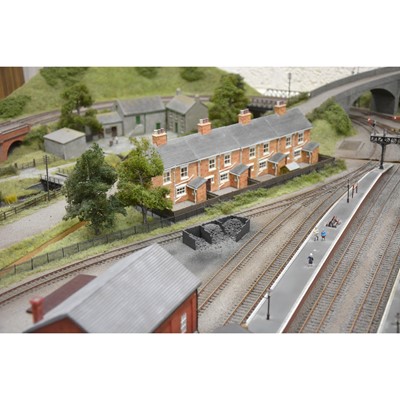 Lot 62 - Large railway layout; comes in four self containing wooden cases, with good landscaping of trees, buildings etc.