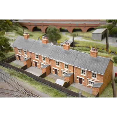 Lot 62 - Large railway layout; comes in four self containing wooden cases, with good landscaping of trees, buildings etc.