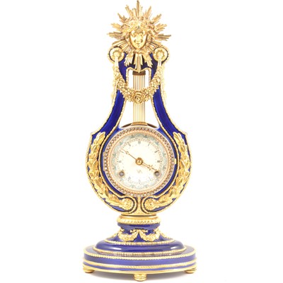 Lot 242 - A reproduction Marie Antoinette lyre clock