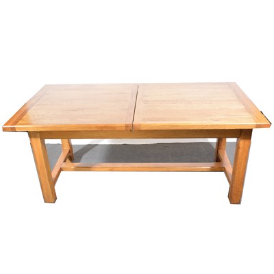 Lot 535 - Modern oak draw-leaf dining table.