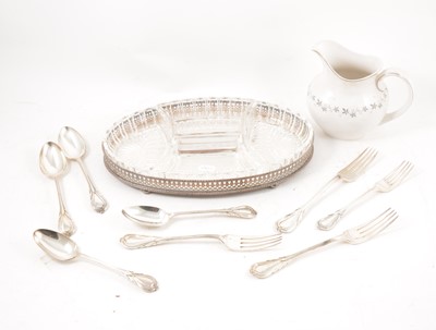 Lot 244 - A set of silver-plated placemats, crystal bowls, cutlery etc.