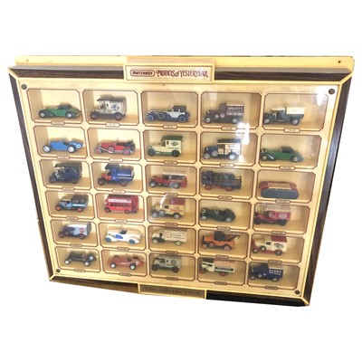 Lot 195 - Matchbox Models of Yesteryear 'The Collection', a large wall-mounted display case with thirty models within.