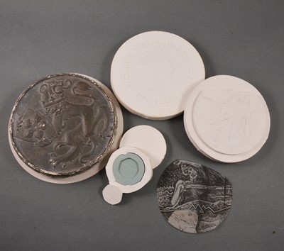 Lot 306 - Mary Milner Dickens - a quantity of plaster and rubber coin dies and other plaster castings