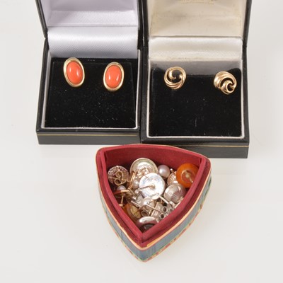 Lot 318 - Eleven pairs of earrings for pierced ears, a pair of oval coral studs in 9 carat gold