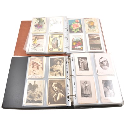 Lot 251 - Two albums of greetings and postcards.