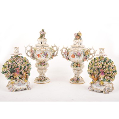 Lot 35 - Pair of Continental vases and covers, and a pair of Chelsea style bocage candlesticks