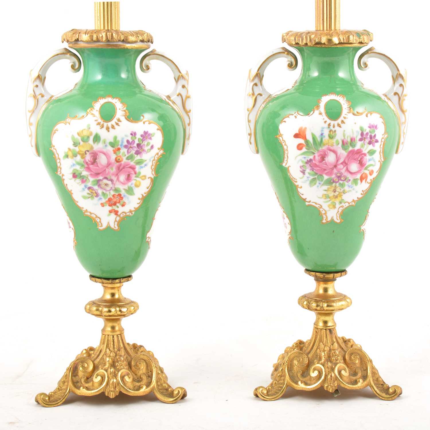 Lot 1 - Pair of French porcelain gilt metal mounted lamp bases.
