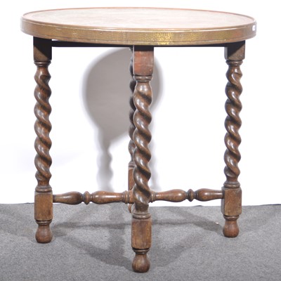 Lot 509 - Brass topped table.