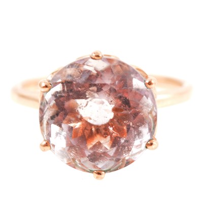 Lot 310 - A rose lilac amethyst dress ring.