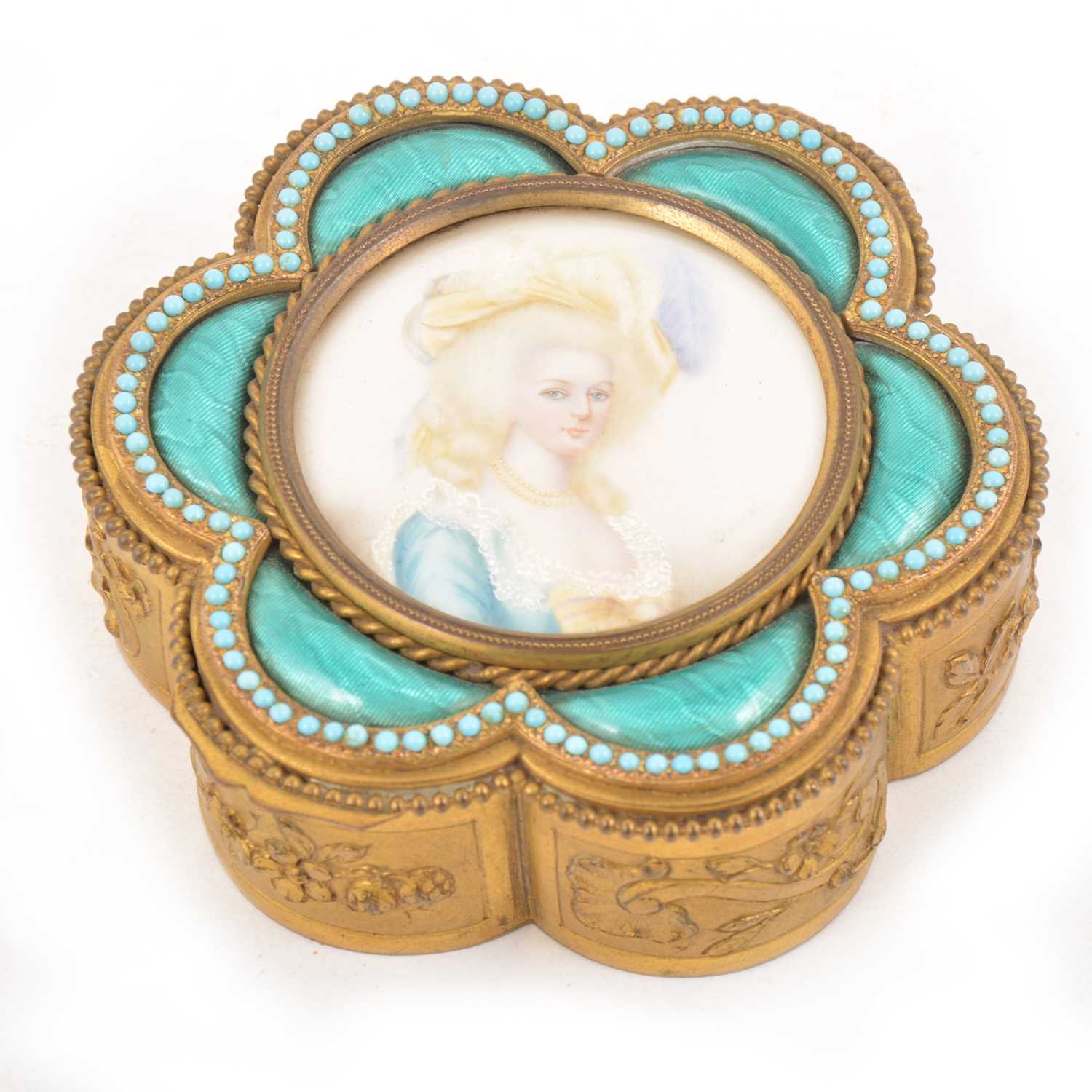 Lot 102 - A gilt metal and enamelled trinket box, inset with a portrait miniature on ivory roundel