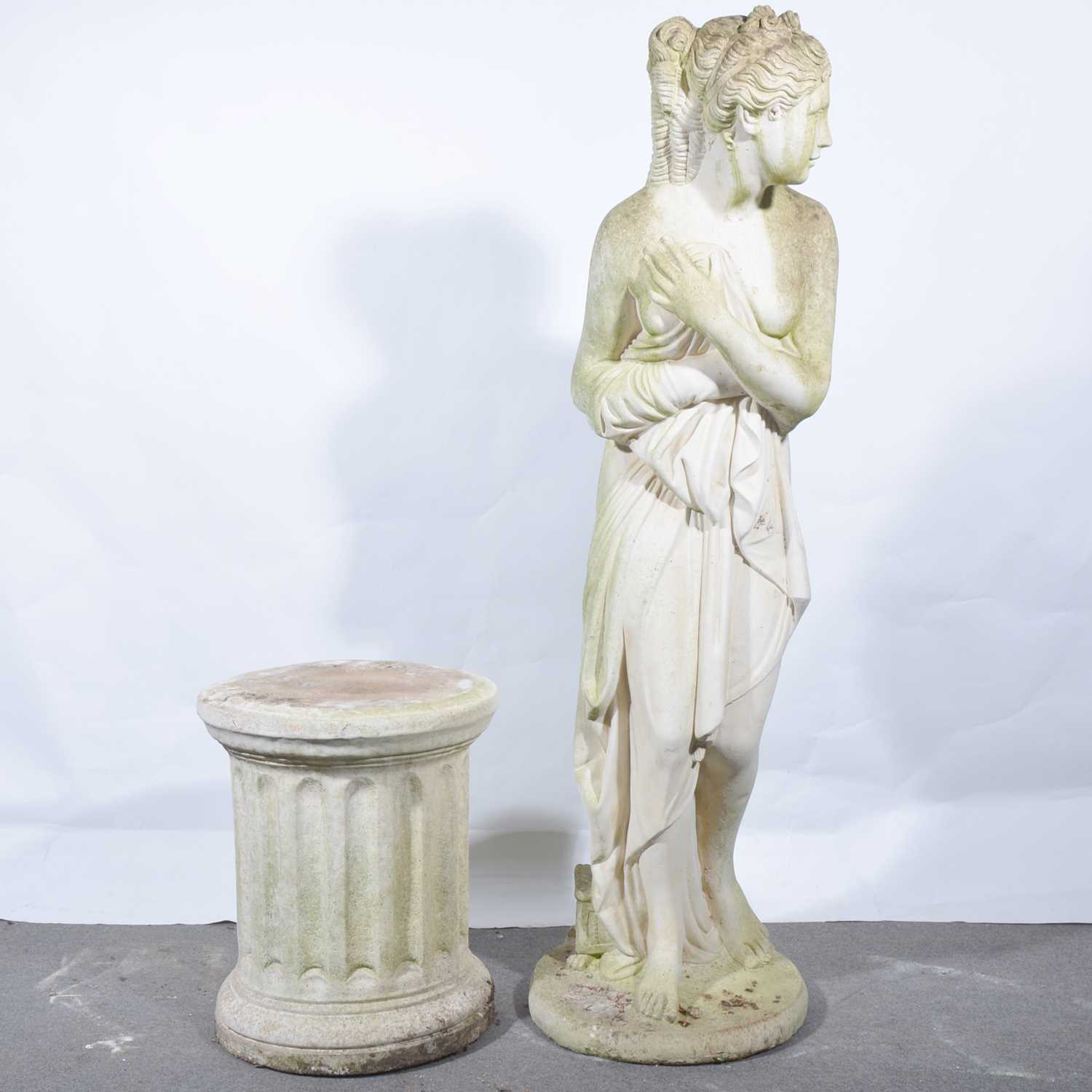 Lot 562 - Cast stone garden statue of a maiden, on a fluted cylindrical plinth