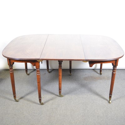 Lot 512 - George III mahogany dining table.